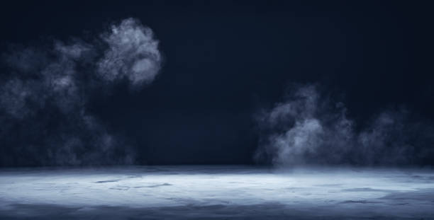 istock Gray textured concrete platform, podium or table with smoke in the dark 1345809661