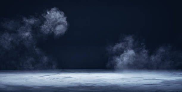 Gray textured concrete platform, podium or table with smoke in the dark stock photo