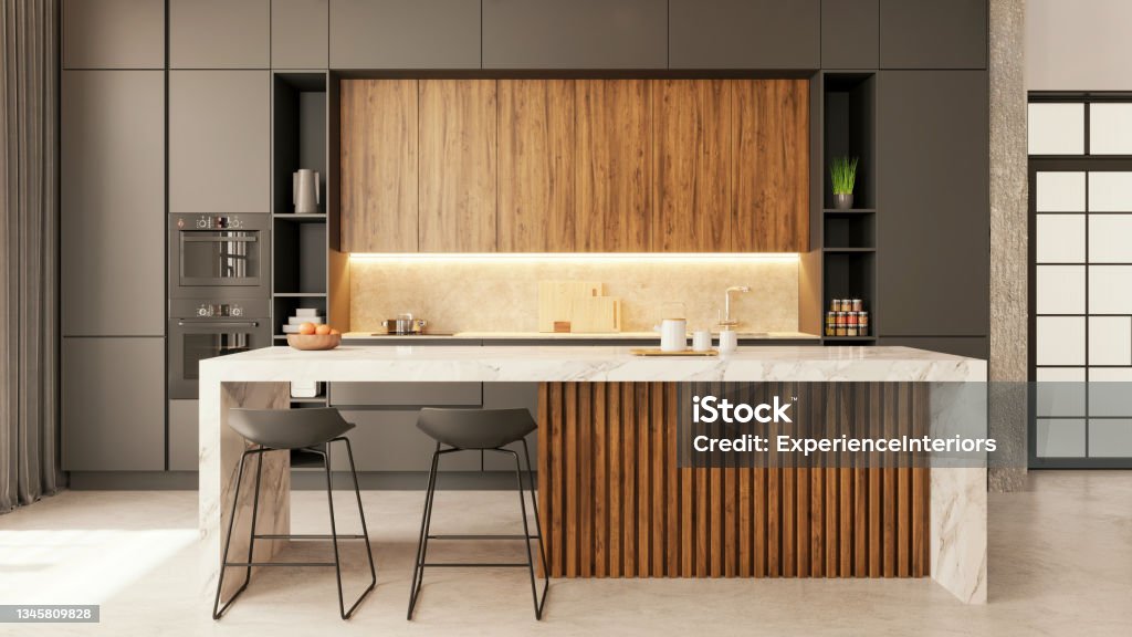 Modern apartment kitchen interior Modern apartment kitchen interior. Large marble kitchen countertop, bar stools, concrete floor and glass door in the background. Copy space template. Render. Kitchen Stock Photo