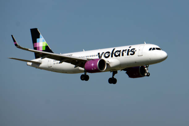 Volaris Airbus A320 Prepares for Landing at Chicago O'Hare stock photo