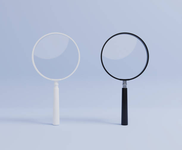 istock Black and white magnifying glass 1345818787