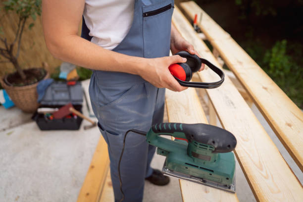 istock Unrecognizable carpenter adjusting ear protectors, before he start to work with sander 1345818865