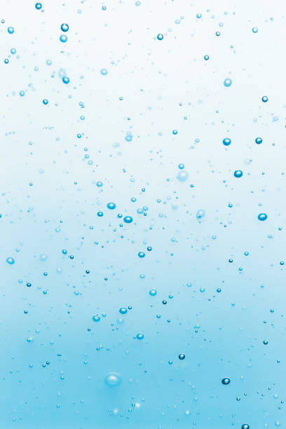 Bubbles in water. Blue bubbles background. Bubbles in clear fresh water. water thinking bubble drop stock pictures, royalty-free photos & images