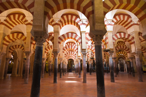Moorish architecture of the praying hall. The Mezquita is regarded as perhaps the most accomplished monument of the Umayyad Caliphate of Córdoba. After the Spanish Reconquista, it once again became a Roman Catholic church.