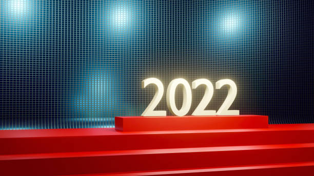 istock New year 2022 numbers on the red presentation pedestal podium platform 1345825893