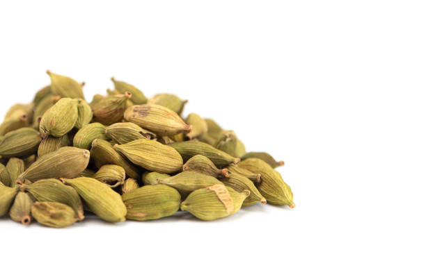 istock Green Cardamom Pods Isolated on a White Background 1345827109