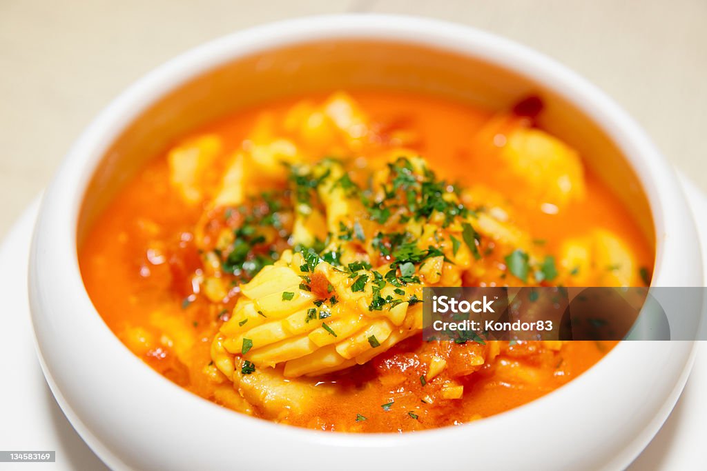 Mediterranean seafood soup Mediterranean tomato seafood soup in plate, close-up Close-up Stock Photo
