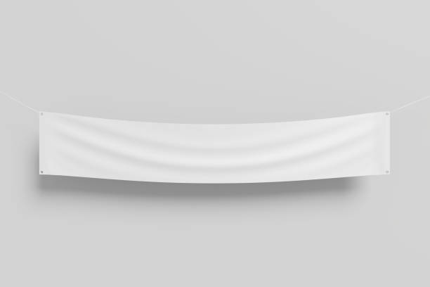 A long horizontal fabric banner hanging from a rope.