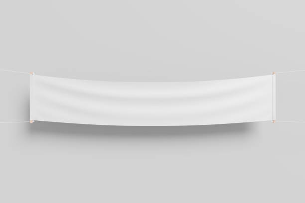 istock A long horizontal fabric banner hanging from a rope. 1345834427