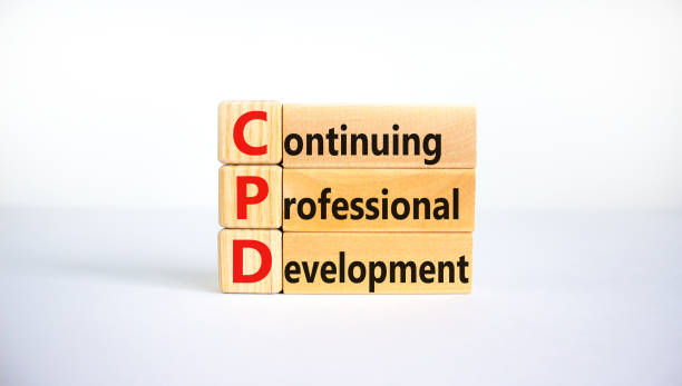 CPD, continuing professional development symbol. Wooden blocks with words CPD, continuing professional development on beautiful white background. Business, CPD concept. stock photo