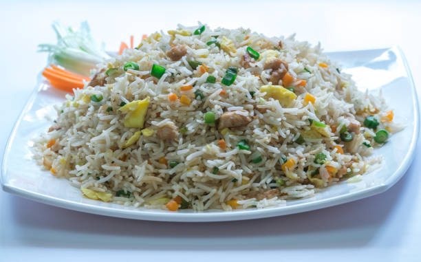 istock vegetable pulao or vegetable pulaav or vegetable biriyaani with rice and vegetables 1345836960