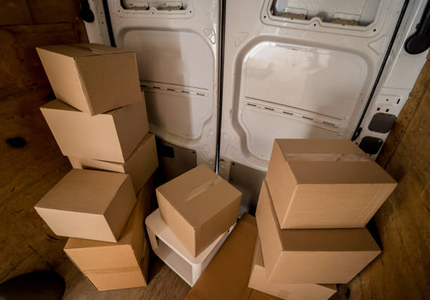 istock Transport boxes inside the minibus near the doors 1345837321