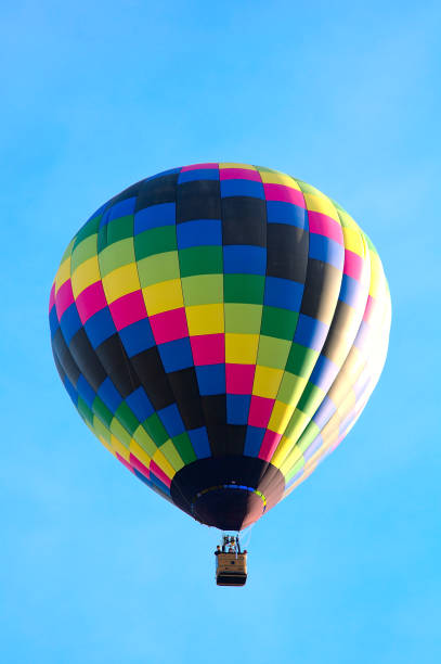 istock Single Colorful Hotair Balloon in Flight 1345839741