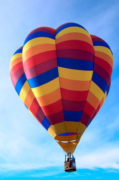 istock Single Colorful Hotair Balloon in Flight 1345839912
