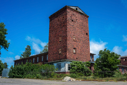 Langeoog, Germany, August, 28, 2023 - Ancient Water Tower On The East Frisian Island Langeoog  on a beautiful sunny summer day