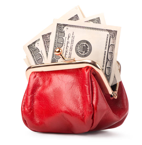 istock Purse and paper dollars 1345849486