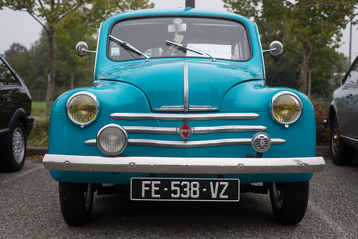 Mulhouse - France - 10 October 2021 - Front view of blue Renault 4CV parked in the street