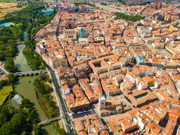 Aerial view of Palencia cityscape on Carrion river with Catholic Cathedral in summer day, Spain