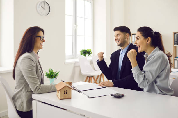 young couple happy about getting approved for mortgage or buying new house or flat - Second Mortgage with Bad Credit - Be Approved