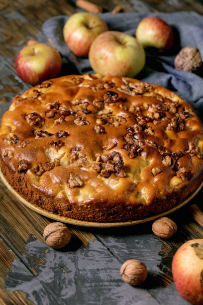istock Homemade apple cake with fresh gardening apples 1345854997