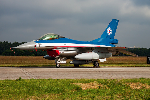 Volkel, Netherlands - June 14, 2013: Military fighter jet plane at air base. Air force flight operation. Aviation and aircraft. Air defense. Military industry. Fly and flying.