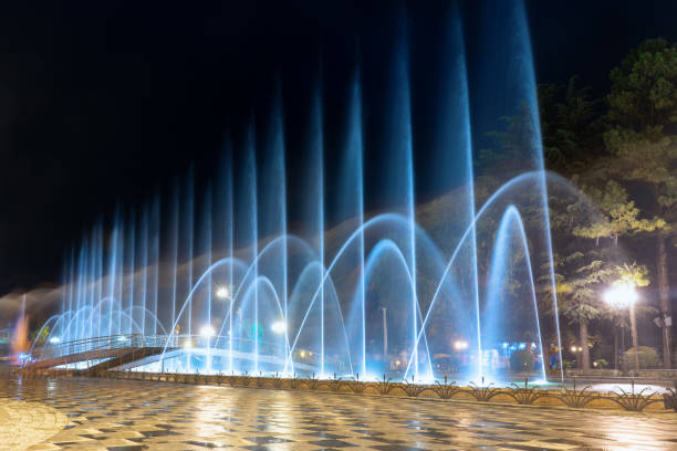 istock fountain on the square at night on a long exposure 1345862523