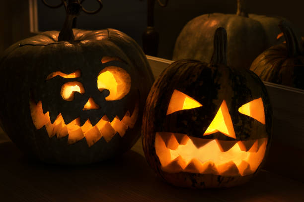 istock Halloween pumpkin smile and scary eyes 1345862536