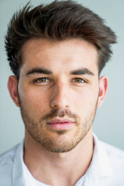 istock Close-up of good looking young man 1345864094