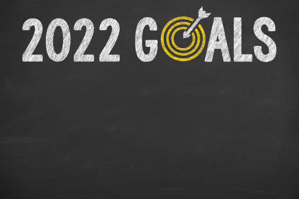istock Writing New Year 2022 Goals on Chalkboard Background 1345865628