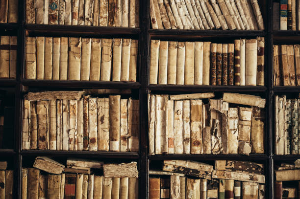 istock Wooden bookshelf full with old books 1345867737