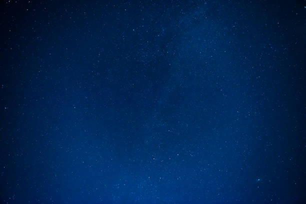istock Dark night sky with many stars 1345869838