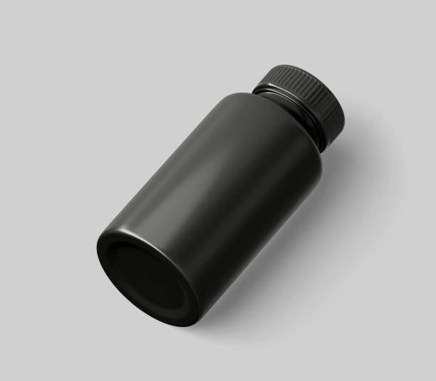 istock Black Matt Plastic Bottle Mockup for medicine, tablets, pills, realistic packaging box template 3d rendering isolated on light background. 1345877886