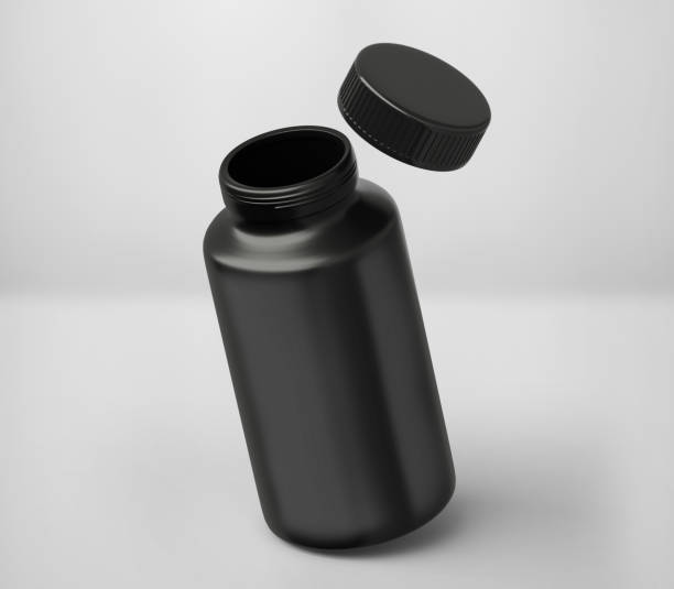 istock Black Matt Plastic Bottle Mockup for medicine, tablets, pills, realistic packaging box template 3d rendering isolated on light background. 1345877900