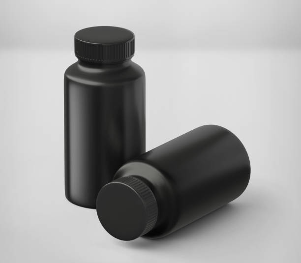 istock Black Matt Plastic Bottle Mockup for medicine, tablets, pills, realistic packaging box template 3d rendering isolated on light background. 1345877909