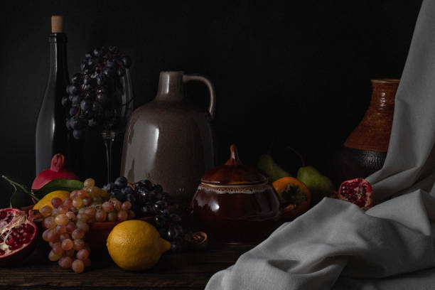 istock Still life with wine and fruits 1345877956