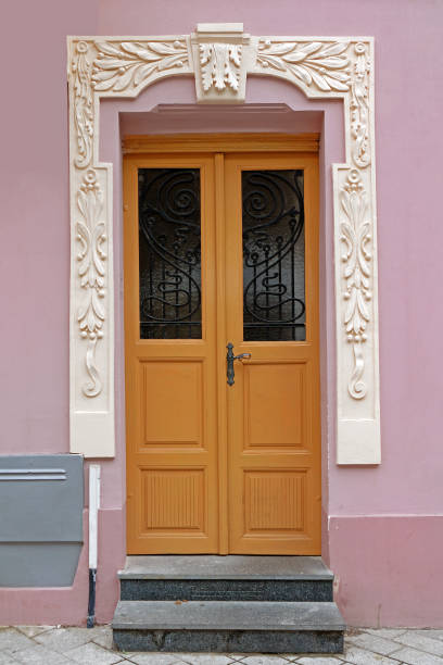 istock Old closed entrance door 1345878161
