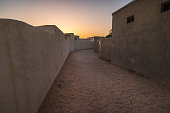 Ras al Khaimah heritage village in Al Jazirah al Hamra filled with ruins of old style objects