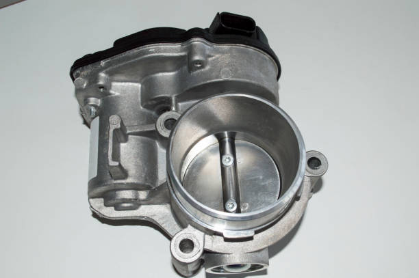 istock Top view of the throttle valve, which lies on a white surface 1345880288