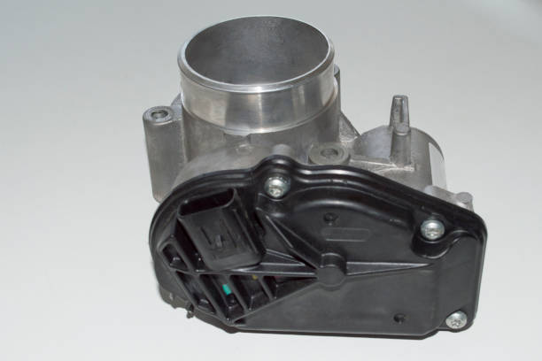 istock The throttle valve with a black plastic cover lies on a white surface 1345880294