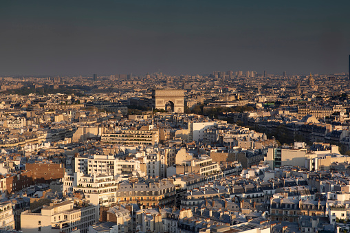 Golden hour sunlight on the city in Paris, France.