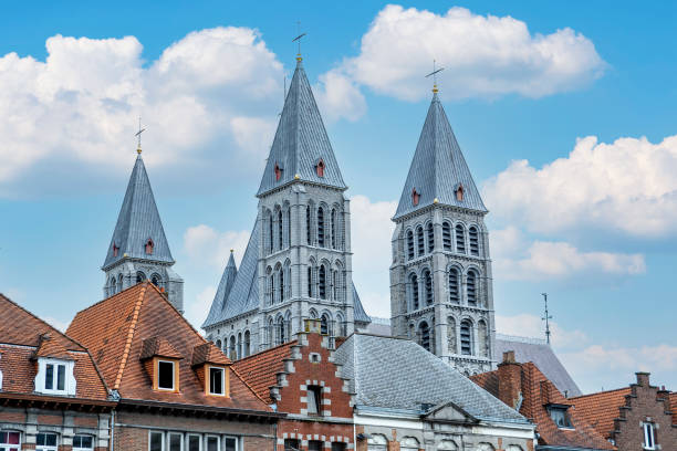 Tournai, Belgium - towers of the cathedral and houses in main square of the city