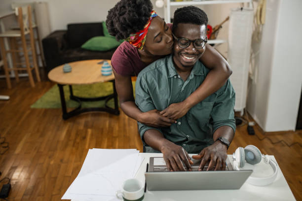 istock A young couple using laptop together 1345885658