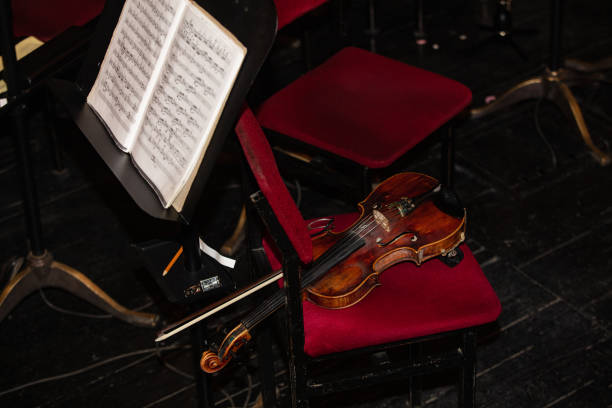 istock violns on chairs during interval  in theatre 1345886533