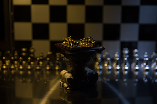 Close up shot of the chess board made of glass,