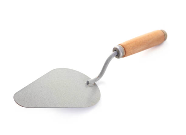 istock Trowel isolated at white background. Mason tool on white 1345887561
