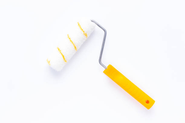 istock Paint roller on white background. Construction tool for house or room renovation 1345887577
