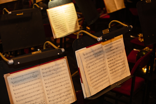 orchestra music stand with notes on concert