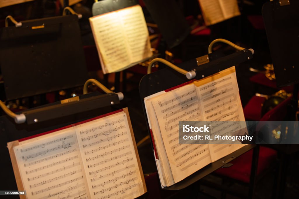 orchestra music stand with notes on concert Orchestra Stock Photo
