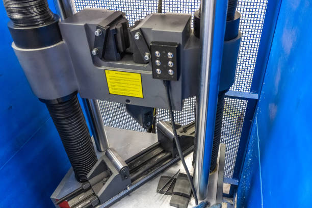 istock Machine for testing metals for strength and deformation in laboratory at metallurgical plant 1345888973