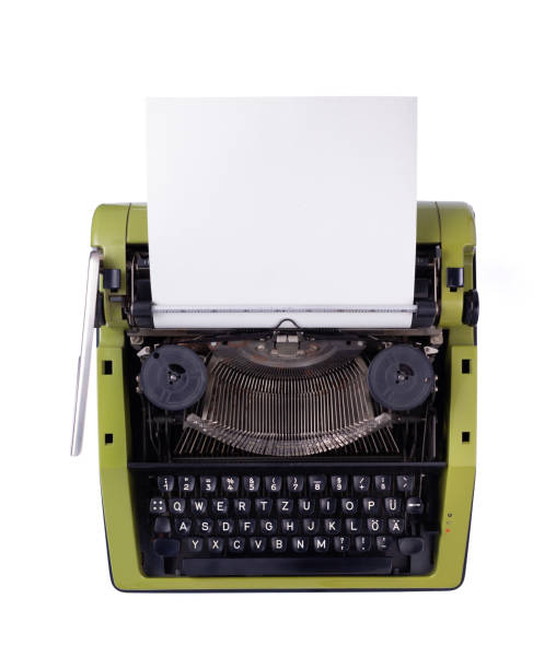 istock Old retro typewriter and blank sheet isolated at white background top view. Type writer at white 1345889671